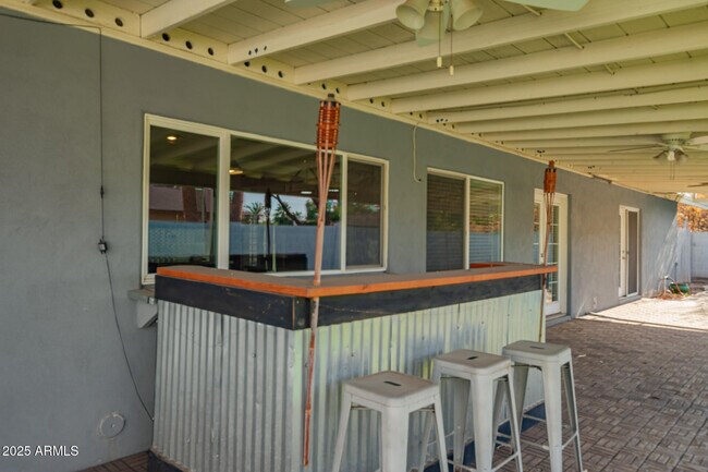 Building Photo - 8902 E Cholla St