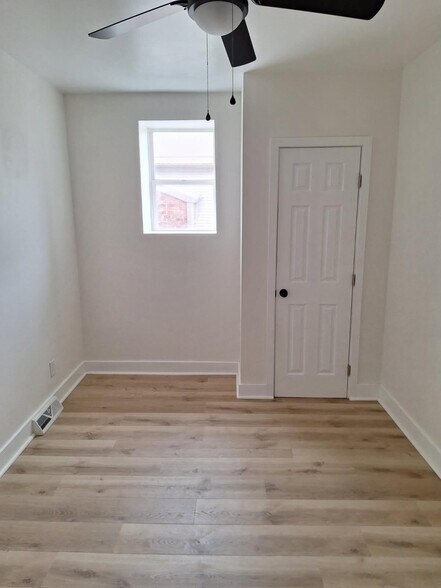 Building Photo - 123-125-125 E 2nd St