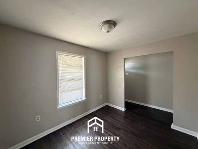 Building Photo - Spacious 4BR/2BA Home in Bartlett Cove | Brick Fireplace & Formal Dining