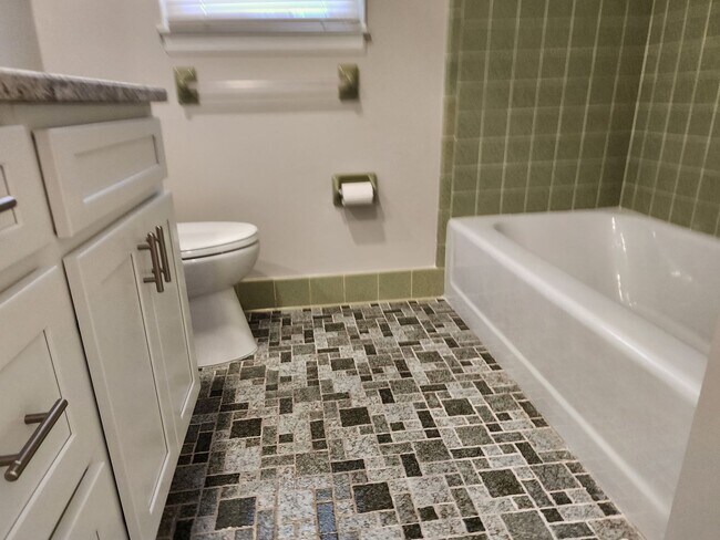 Building Photo - Remodeled Brick Rancher With a Screened Po...