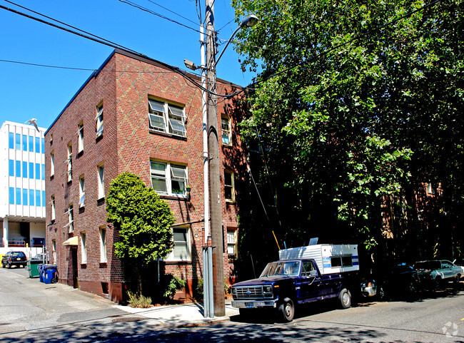 Building Photo - Spacious Units in a Vintage Brick Building...