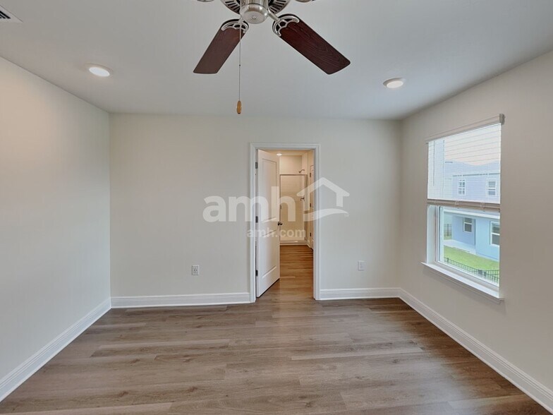 Building Photo - 6004 Pinewood Ests Dr