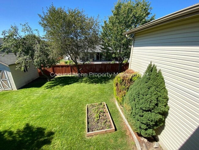 Building Photo - 4 bedroom home in Woodland Meadows!