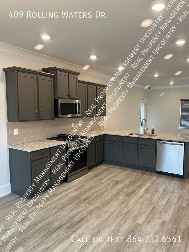 Building Photo - 409 Rolling Waters Dr