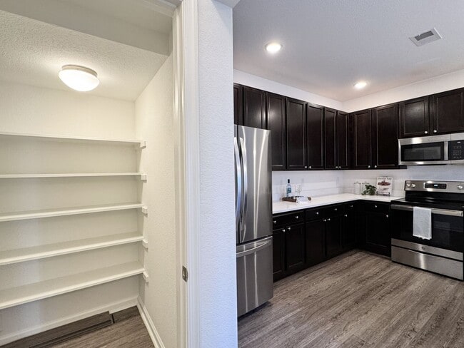 Building Photo - Available NOW! 1st Time Rental! Water, Sewer Trash, Landscaping, Community Pool Included!