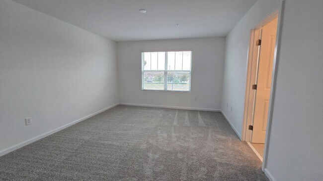 Building Photo - Brand-New Apopka 4Bed/2.5 Bath Townhome Avail for Rent! Be The first to Live Here!