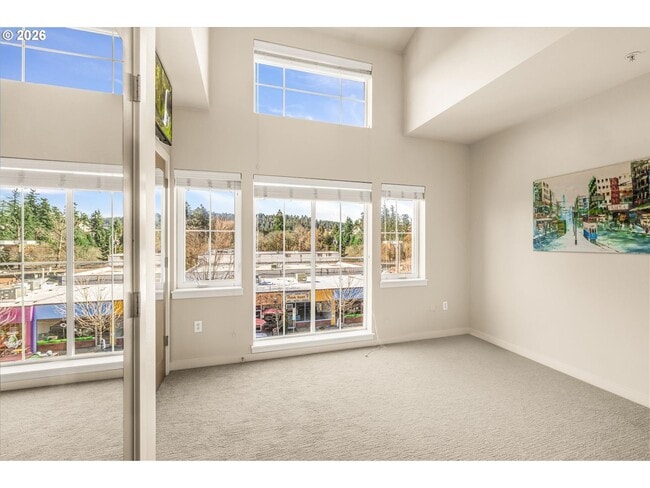 Building Photo - Main Street Living with Granite Kitchen, Gas Fireplace, and MAX Line Access