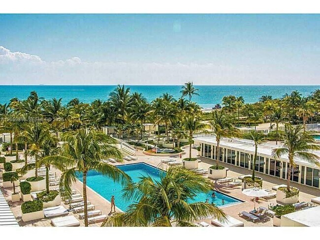 Building Photo - 10275 Collins Ave