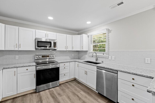 Building Photo - Charming, Newly Remodeled 3 BR, 1.5 BA Home with Fenced Yard on Large Private Lot