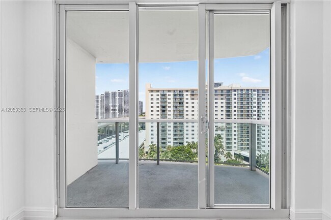 Building Photo - 19380 Collins Ave