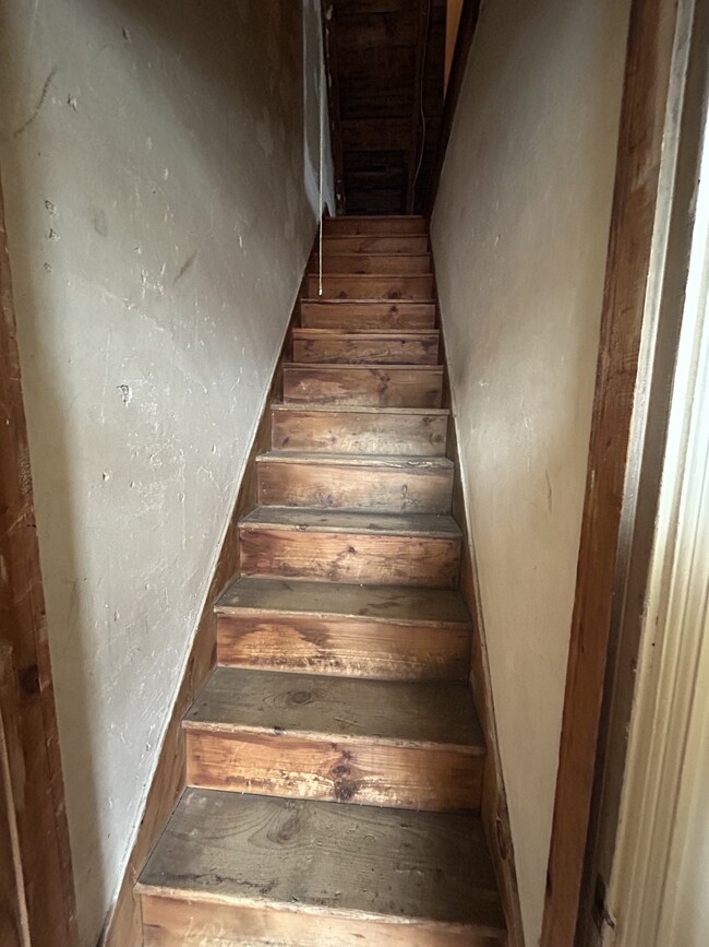 Stairs to the attic. - 23 Pleasant St