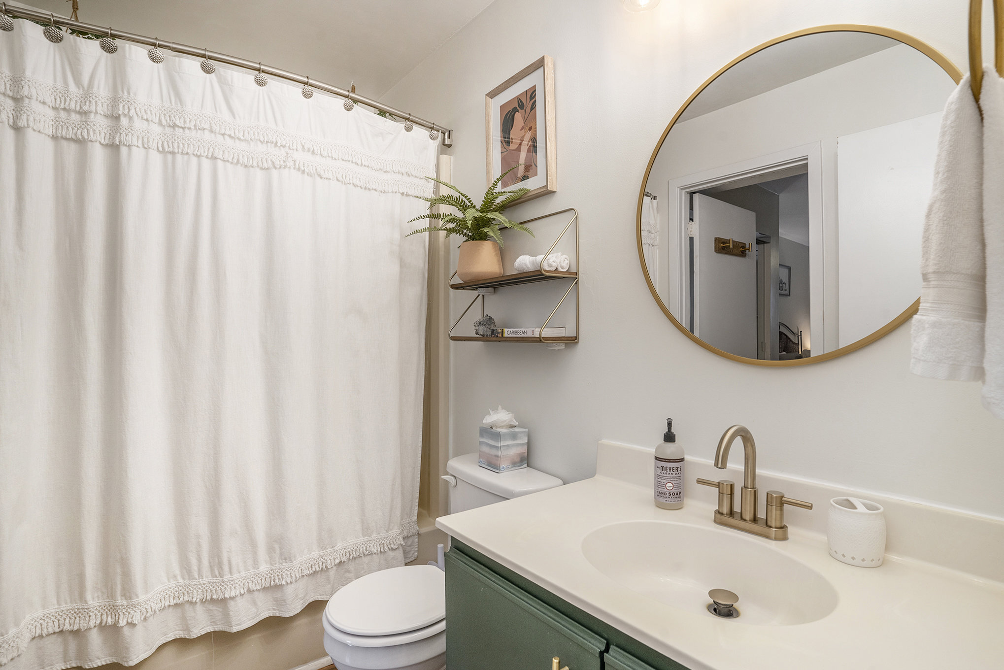 Full downstairs bathroom with shower/tub combo - 1261 Marshview Dr