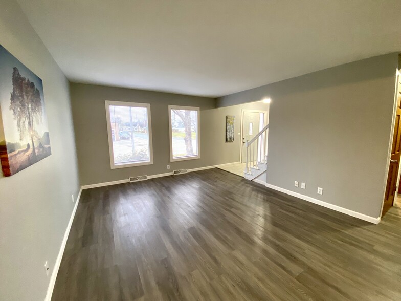 Bright Sunny Living Room with New Luxury Vinyl Flooring - N89W15976 Main St