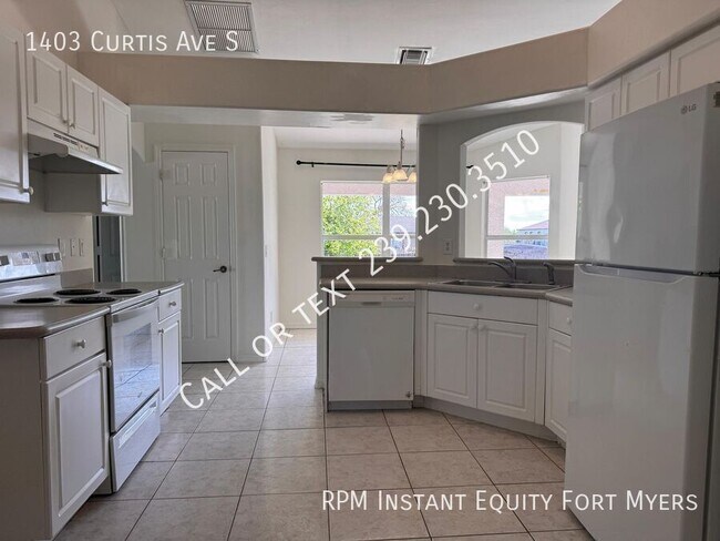 Building Photo - 1403 Curtis Ave S