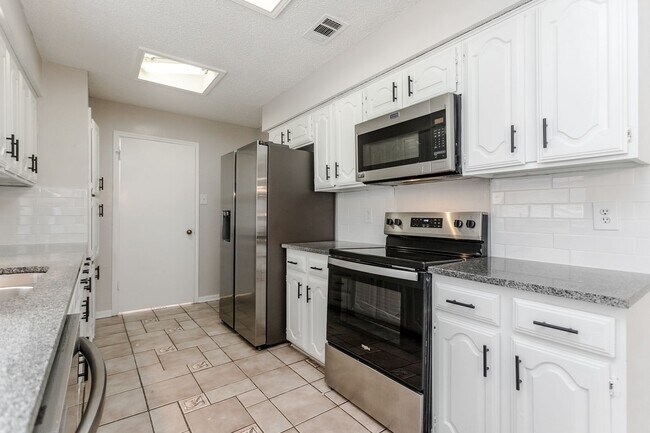 Building Photo - 4 Bedrooms | 2 Bathrooms | 2-Car Garage | Pool | Park-Front Living