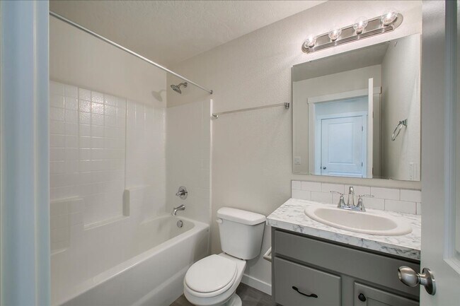 Building Photo - Two Story Townhome Located Off Of Amity & Five Mile!