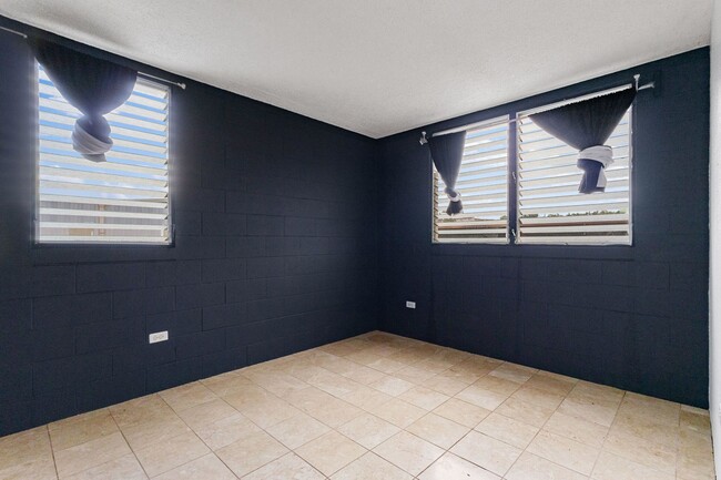 Building Photo - Discover this pet-friendly 2-bedroom condo