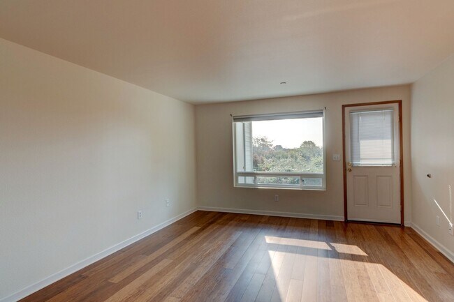 Building Photo - 2 bedroom/2 bathroom: Ground-Floor Condo with Water View ($200 off first 3 months)