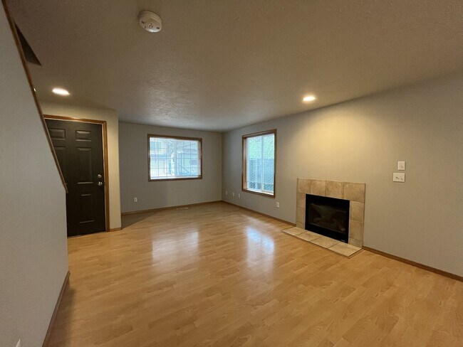 Building Photo - 3-Bed Home with Fireplace, Fenced Backyard, 2 Car Garage & Front Patio!