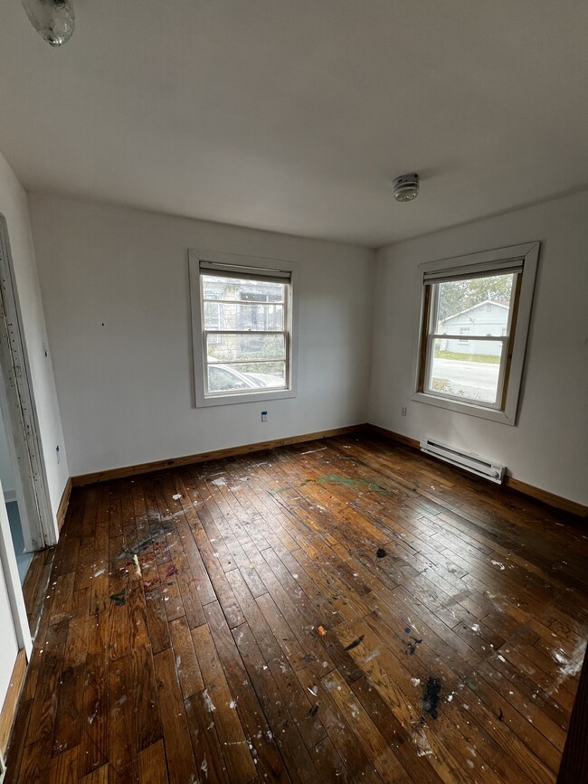 Room with front corner window and westward facing window. - 1903 Hampton Ave