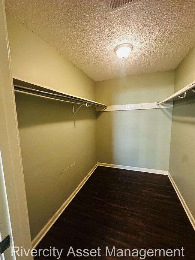 Building Photo - charming three-bedroom, two-full-bath resi...