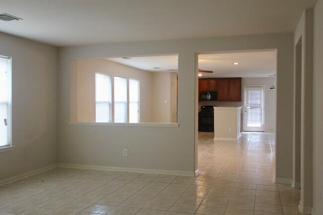 Building Photo - 9414 Coatsworth Dr