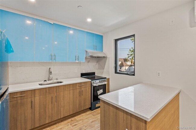 Building Photo - 213-41 38th Ave