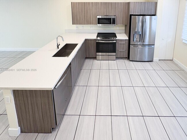 Building Photo - 6416 NW 102nd Ct