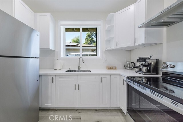 Building Photo - 12809 Woodley Ave