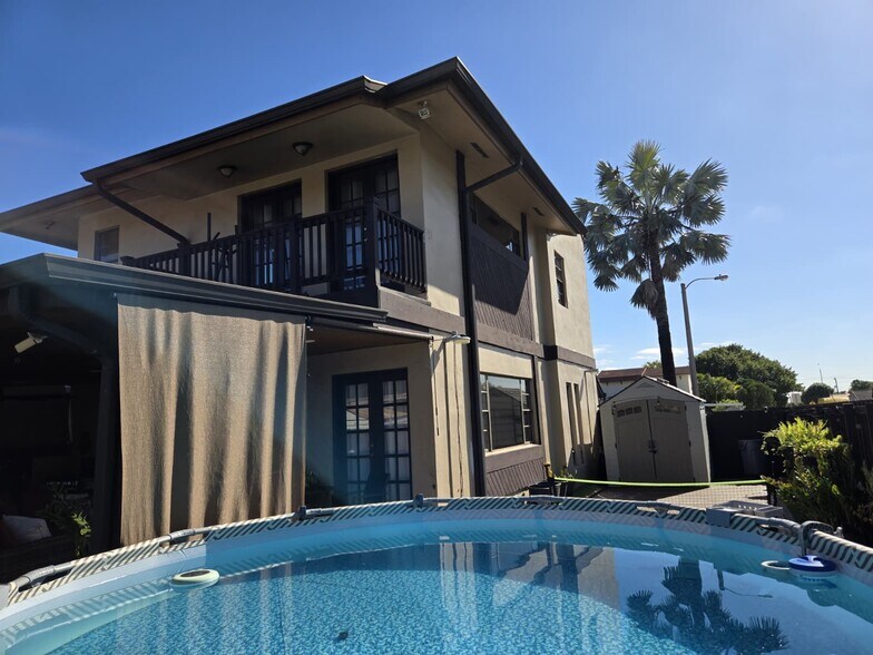 Building Photo - 1397 W 38th Pl