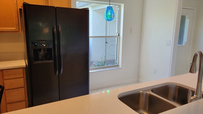 Building Photo - Annual unfurnished  renovated 2/2 villa in...