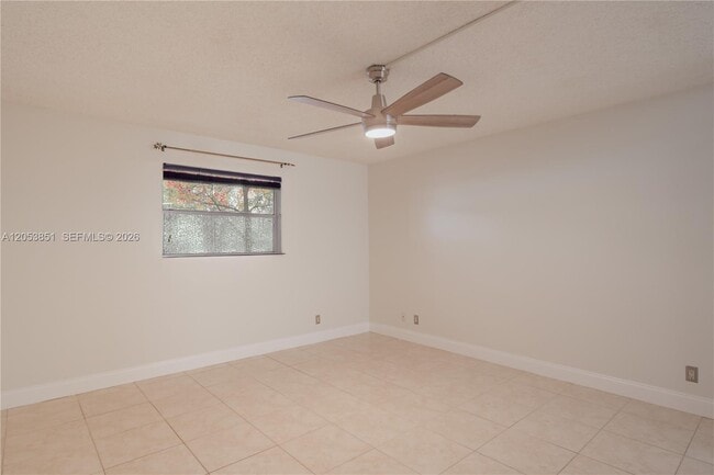 Building Photo - 2700 Coral Springs Dr
