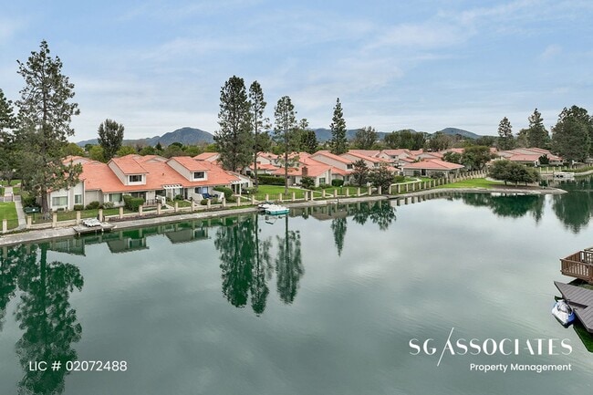 Building Photo - Adorable WATERFRONT Gated Lakeside Villas ...