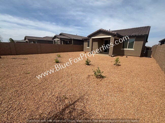 Building Photo - 35049 S Lasso Ln