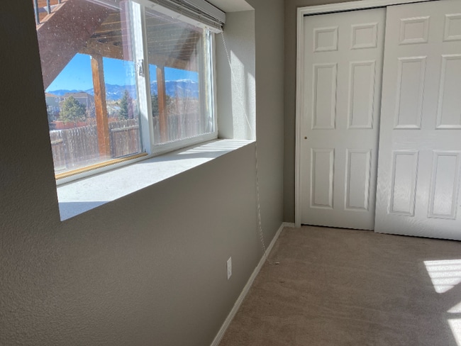 Building Photo - 7047 Wagon Ridge Dr