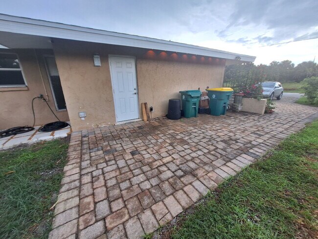 Building Photo - Gulf Access Home on Canal Available Now