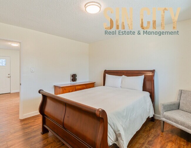 Building Photo - "Charming 4-Bedroom Retreat in Las Vegas –...