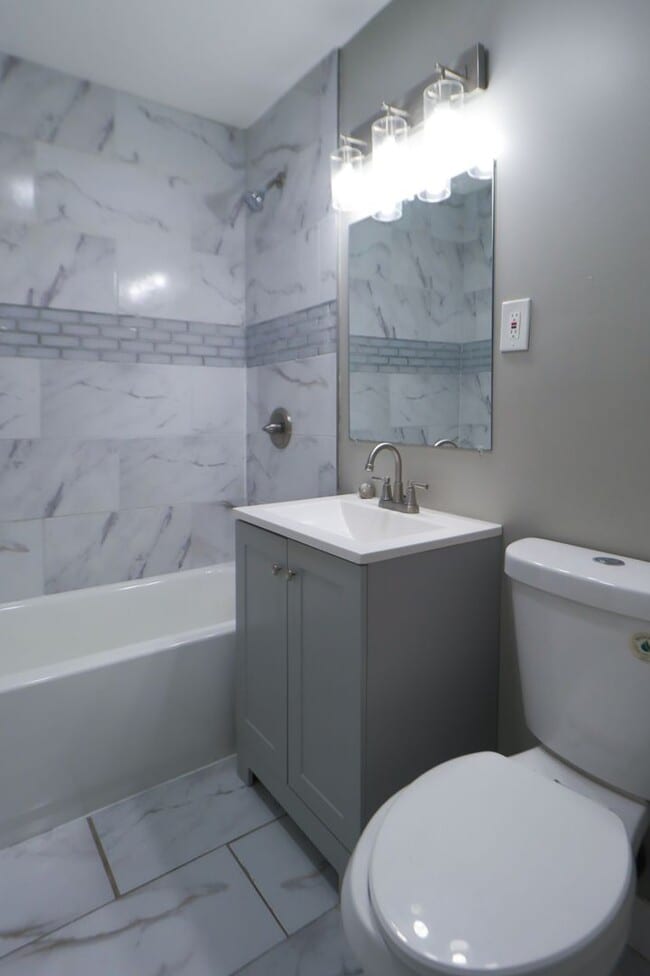 Building Photo - Spacious & Stylish 4-Bedroom Home