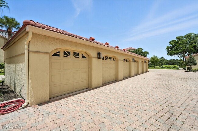 Building Photo - 7032 Pelican Bay Blvd