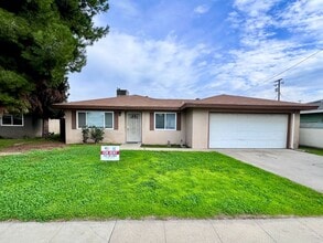Building Photo - $2,050 Shields & Fowler, 4 Bedrooms - N. Purdue Ave, Fresno