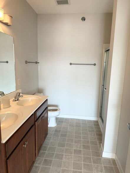 Primary bath with double vanity and shower - 3540 Library Dr