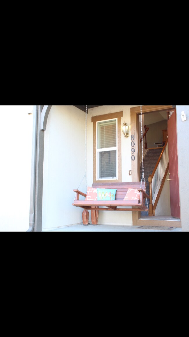 Front porch looks at open space walkway - 8090 E 29th Ave