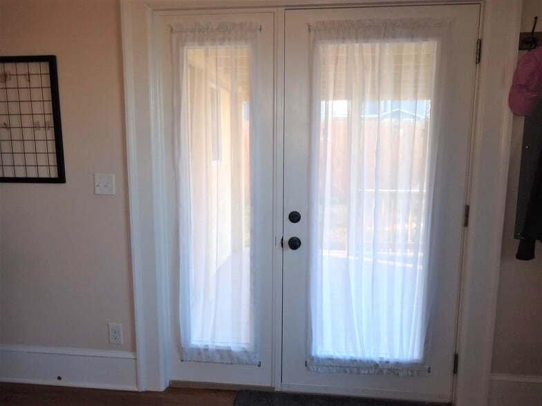 Privay sheers on back door - 205 Douglas Avenue