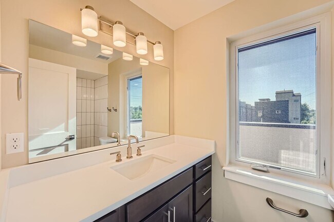 Building Photo - Modern 4BR Townhome Near Sloan’s Lake | Rooftop Deck, Finished Basement & Garage