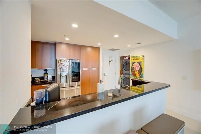 Building Photo - 7901 Hispanola Ave