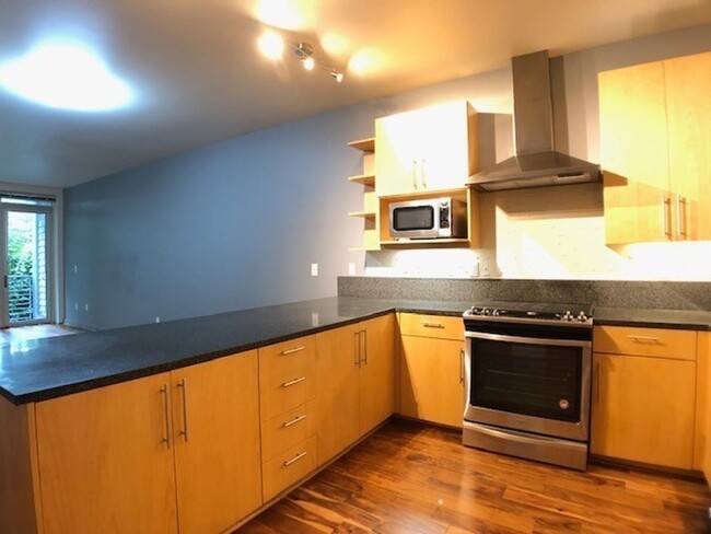 Building Photo - Fantastic SE 2 Bed 2.5 Bath + a Den Condo ...