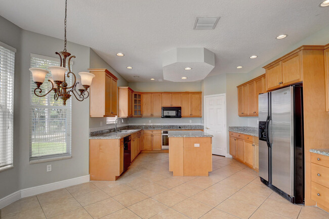 Building Photo - 9864 Woolworth Ct