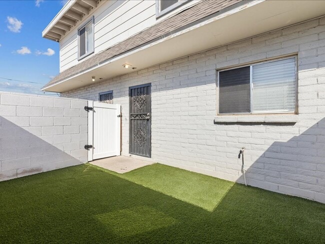 Building Photo - Two-Story Home with Brand New Appliances & Private Turf Backyard!