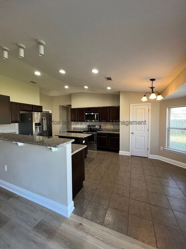 Building Photo - 7045 Harvest Way