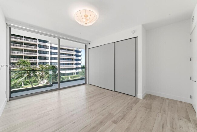 Building Photo - 10203 Collins Ave